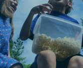 Children eating popcorn