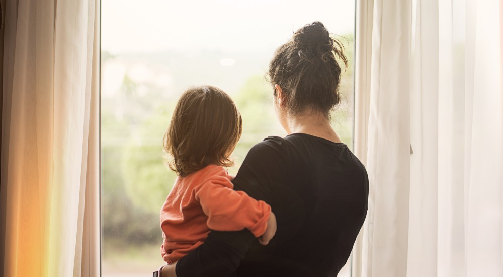 mom holding child