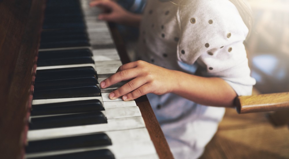 Child playing piano