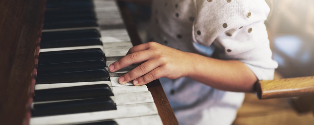 Child playing piano